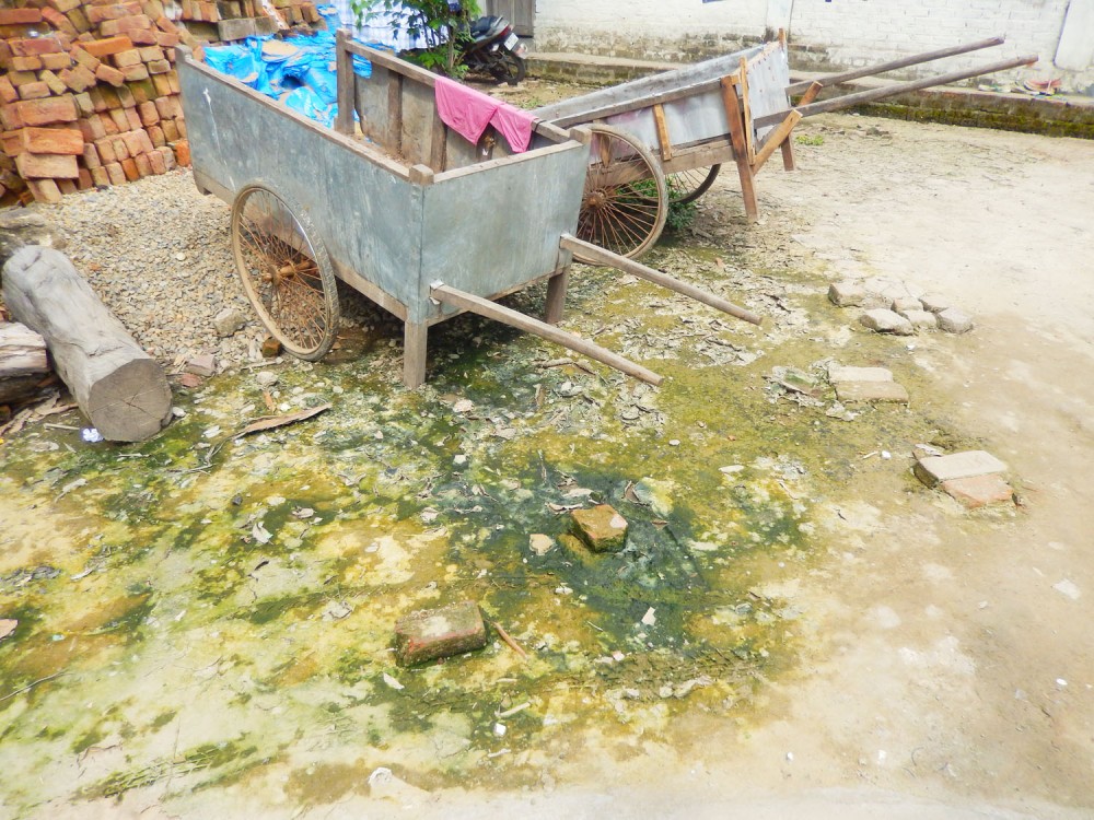 Carts used for waste transport (left), unclogged drainage (right) in Supply Colony, Dimapur.